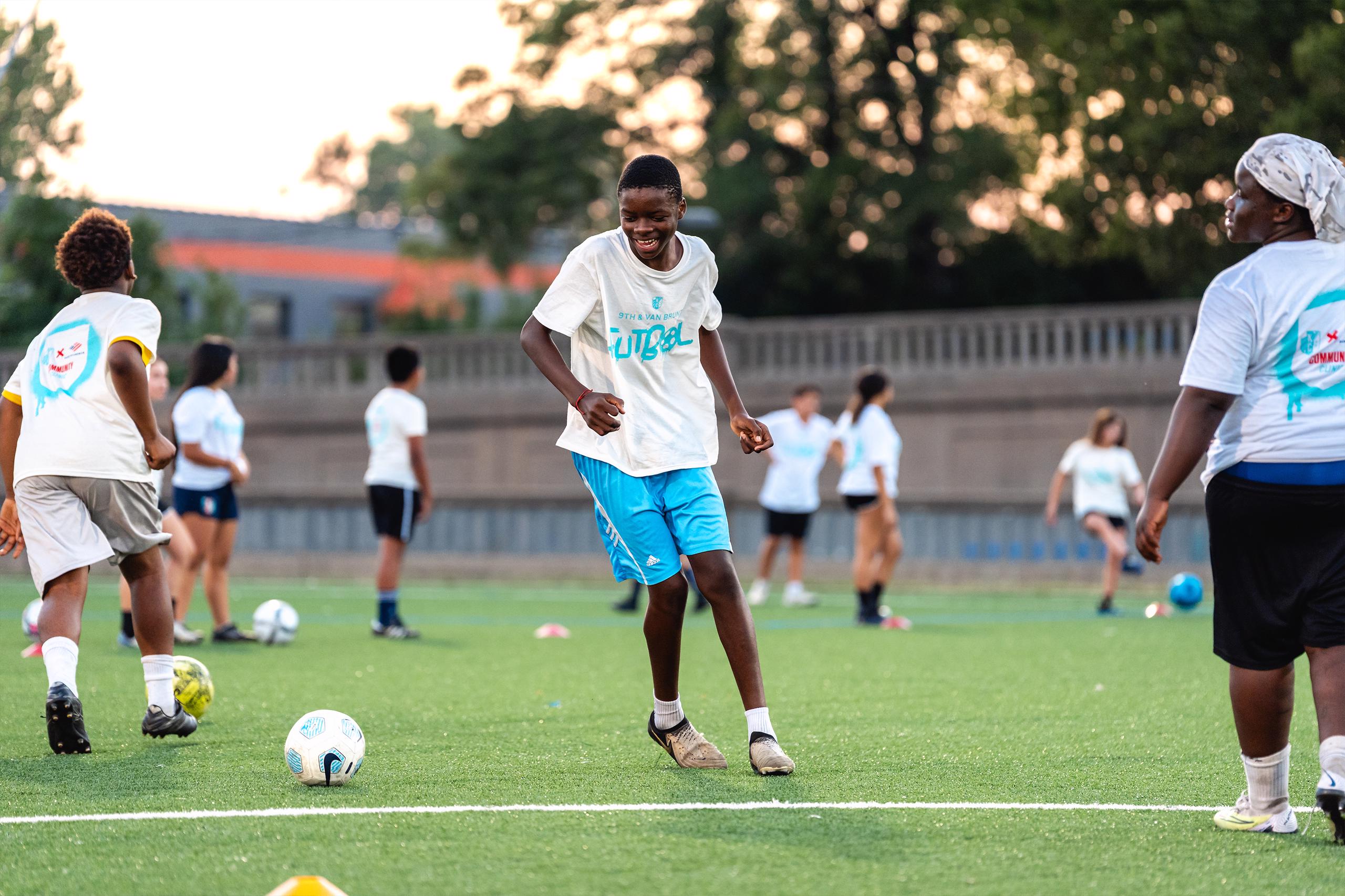 Kids Playing with Soccer Balls