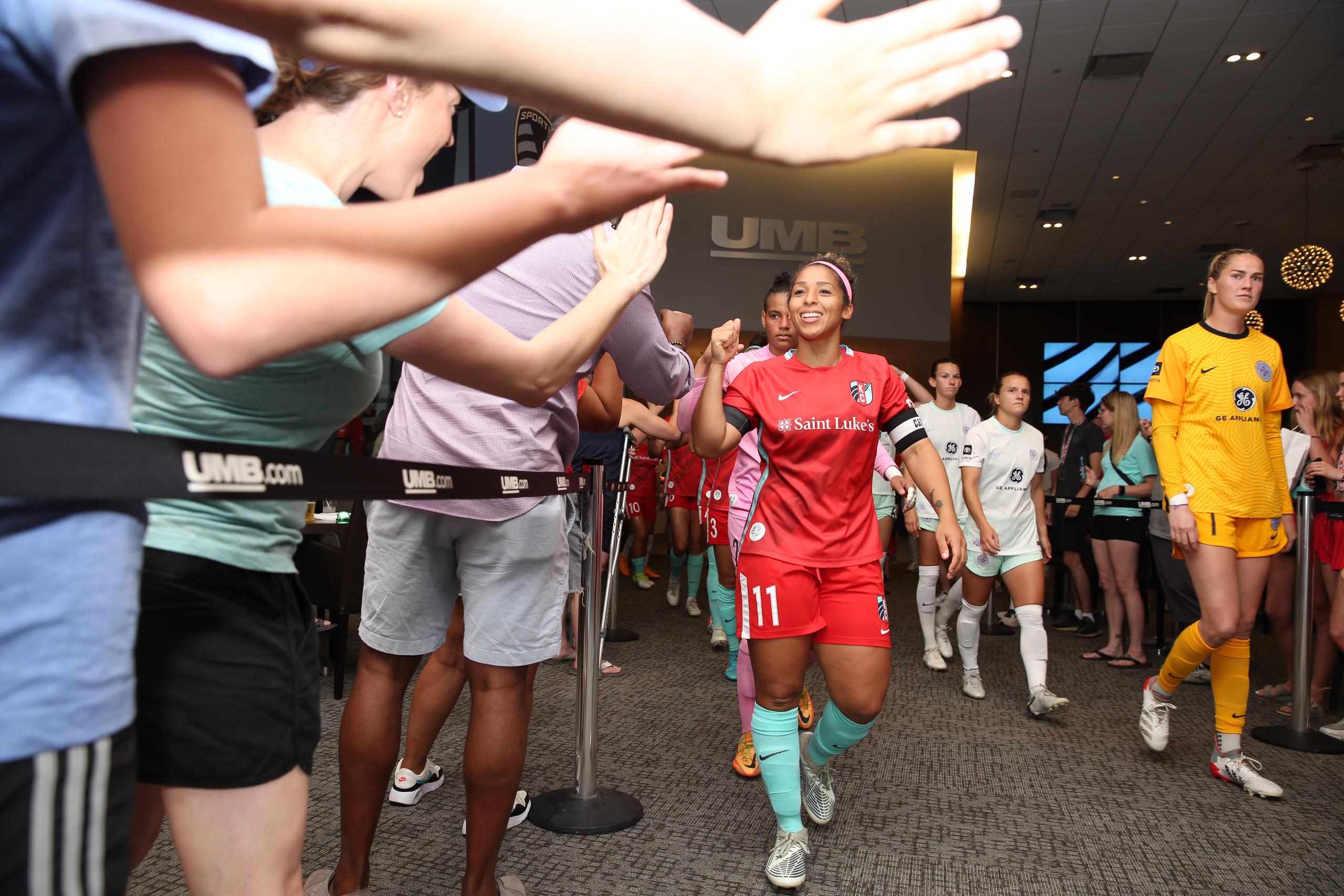 Desi giving fans high-fives