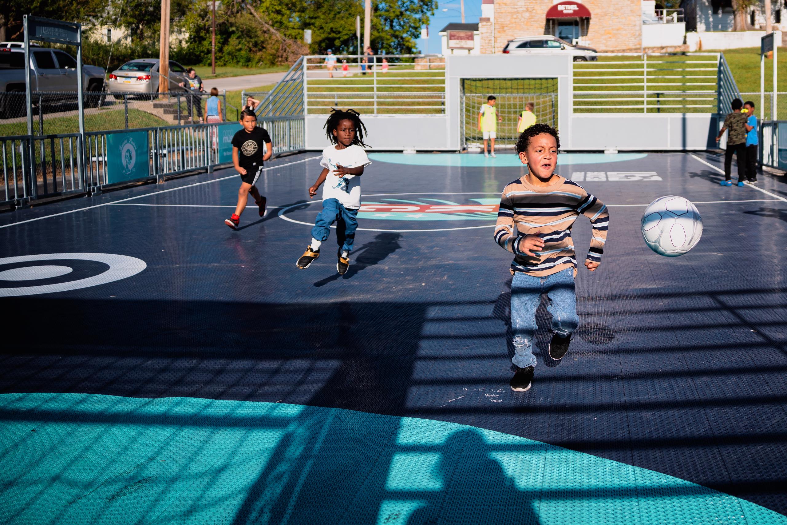 Kids playing on Banneker Mini Pitch