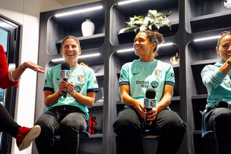 Izzy Rodriguez and Rocky Rodriguez speaking on a stage in front of Sideline the Stigma attendees.