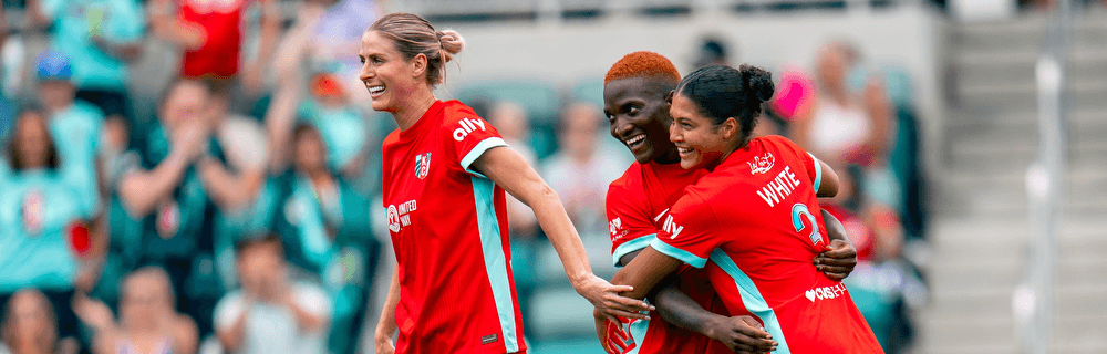 Temwa Chawinga and her teammates after scoring a goal